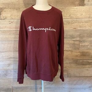 Champion women’s burgundy crew neck sweatshirt in size medium